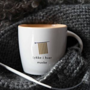 Strikkekopp nr 11 "Lykke i hver maske"
